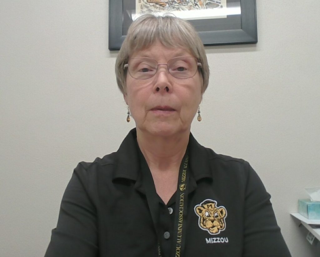 Deb's profile picture in her office.